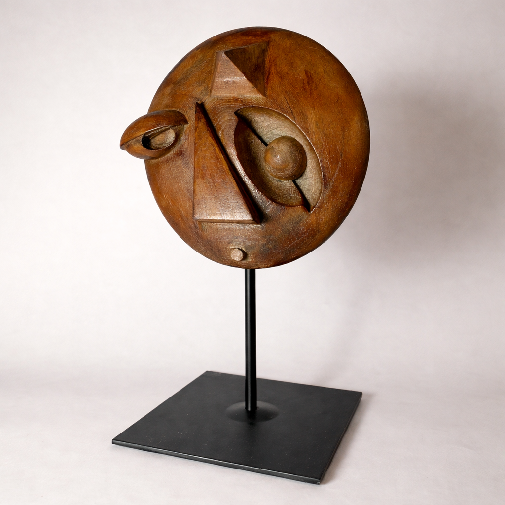 3D printed wood sculpture: geometric forms including sphere, triangle, pyramid nested within circular disc on metal base