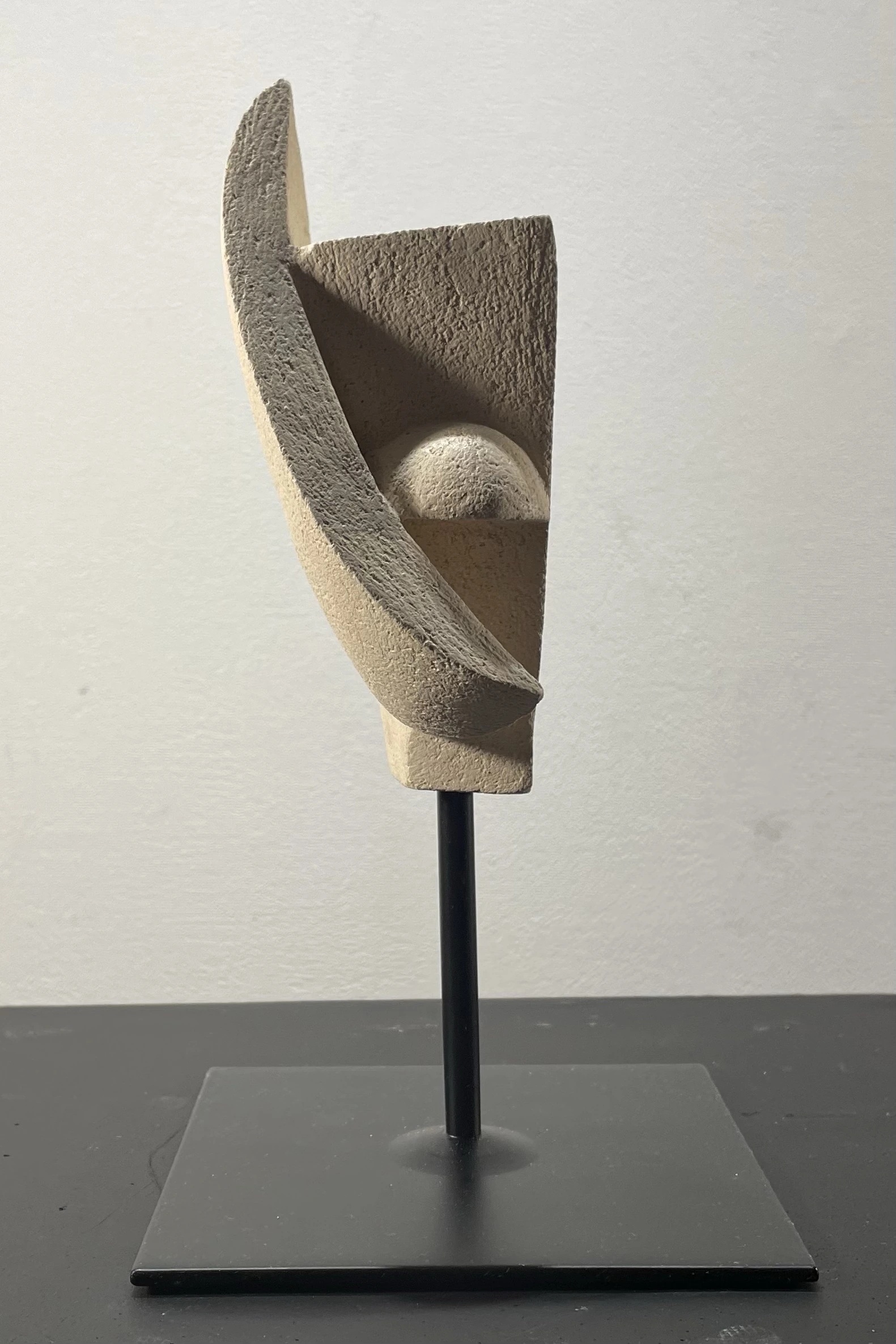 Dreamer by Arnaud Quercy at Art Quam Anima — Ceramic Sculpture on Metal, Contemporary ceramic sculpture with curved forms and patina effects mounted on black metal stand